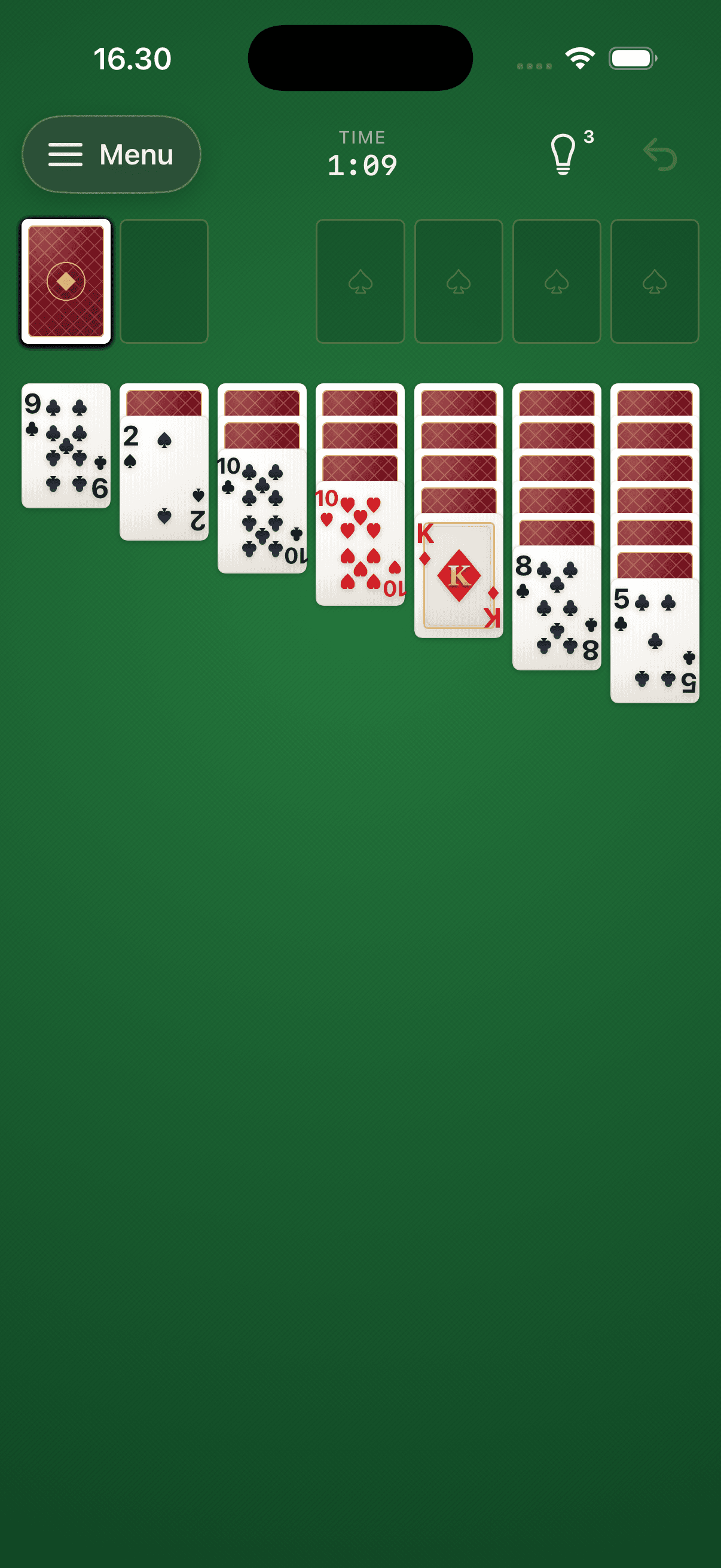 A Klondike deal in progress — seven tableau columns, four empty foundations, the stock, a move timer and three hints left